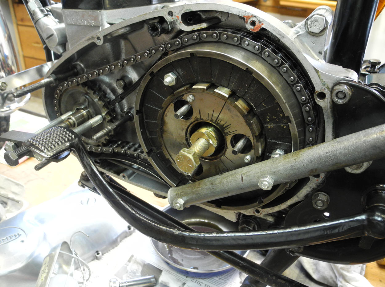a home-made Triumph clutch loching tool in use